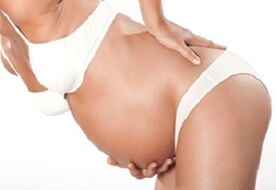 Low's pain in the girl during pregnancy